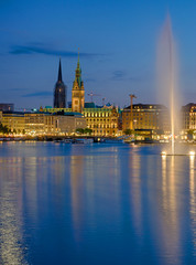 Naklejka premium Downtown Hamburg with the Binnenalster lake at dawn