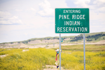 Entering Pine Ridge Indian Reservation Road Sign - obrazy, fototapety, plakaty