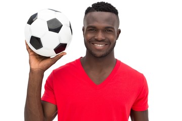 Portrait of a smiling handsome football fan