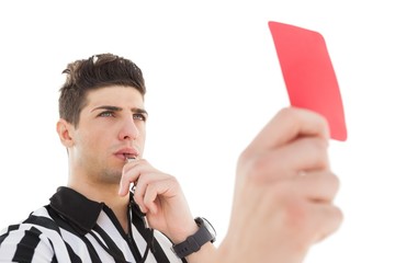 Serious referee showing red card