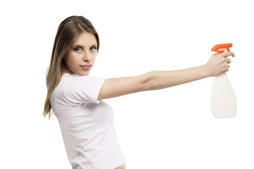 girl with spray detergent