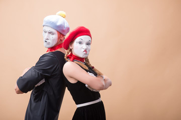 Fototapeta premium Couple of two funny mimes isolated on background