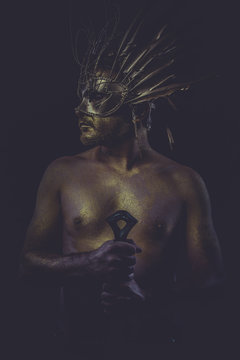 masculine, golden bodypaint, man with gold helmet, ancient warri