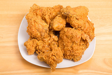 Square Plate of Fried Chicken on Wood Table