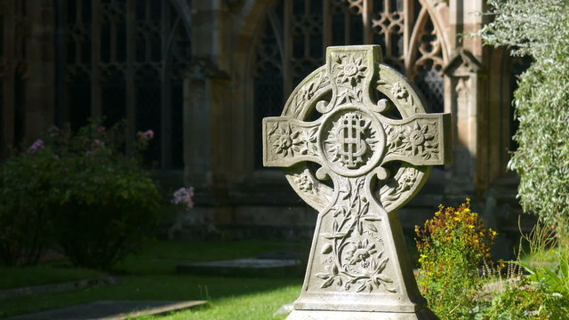 Celtic Christian cross in a churchyard.