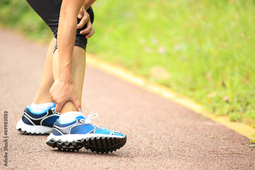 Sticker woman runner hold her twisted ankle