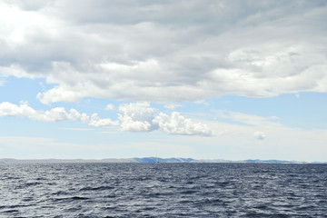 Fototapeta na wymiar grey clouds over Adriatic Sea in Dalmatia