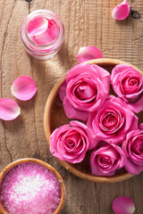 Obraz na płótnie Canvas rose flowers petals herbal salt for spa and aromatherapy