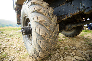 Fototapeta na wymiar wheel of the car in the mud