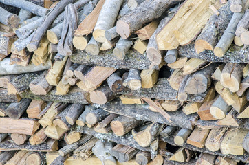 Wooden logs for the fireplace in winter