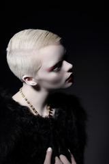 Fototapeta premium Individuality. Glamorous Blond Woman with Short Haircut