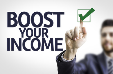 Business man pointing the text: Boost Your Income