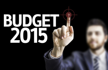 Business man pointing the text: Budget 2015