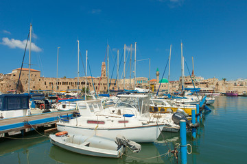 Fototapeta na wymiar Port of Acre, Israel. with boats and the old city