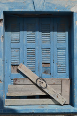 Old window of ruined home in Kefalos