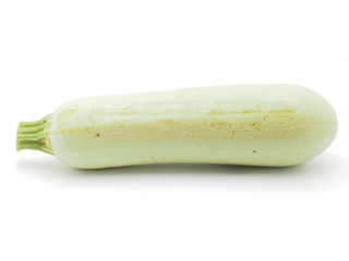 green zucchini on white background