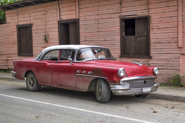 Classic red american car in Guantanamo, Cuba