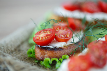 toast with cheese and cherry tomatoes