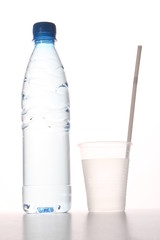 water bottle and plastic cup