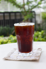 Ice black coffee , americano.