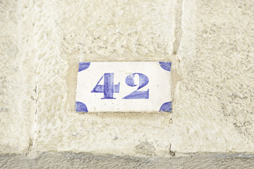 Number forty-two on a wall of a house