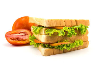 Sandwich with vegetables on white background