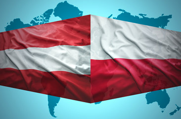 Waving Austrian and Polish flags