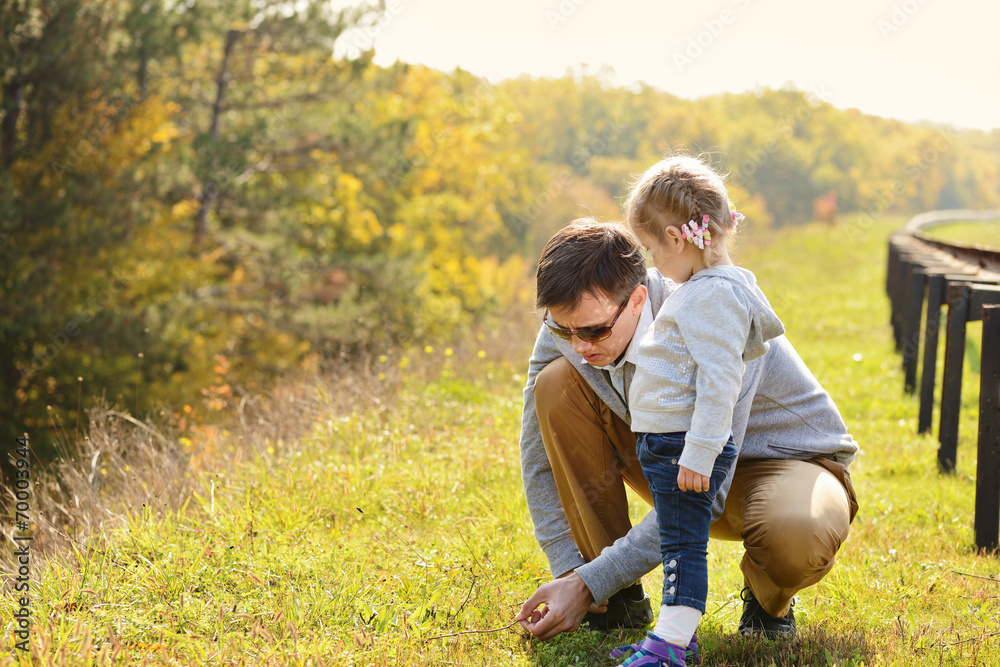 Poster father and toddler daughter