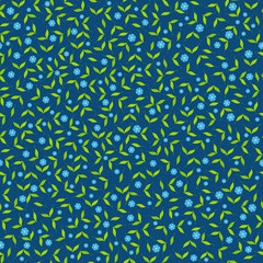 Seamless background of leaves and small flowers