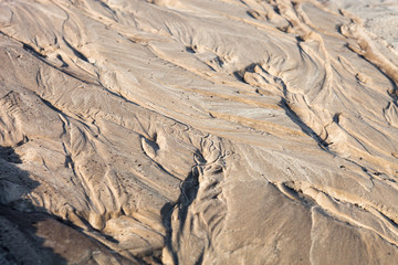 Sand surface with the relief formed by water currents