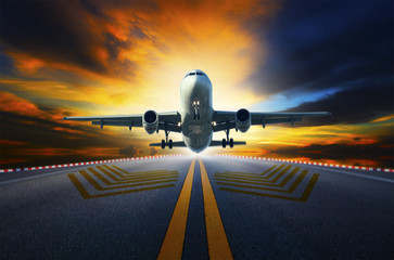 passenger jet plane preparing to take off from airport runways w