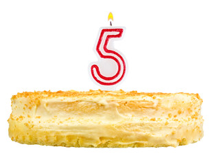 birthday cake with candles number five isolated on white