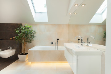 Fototapeta na wymiar Modern bathroom with illuminated bathtube