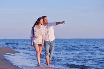 young couple  on beach have fun