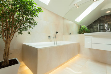 Illuminated bathtube in modern bathroom