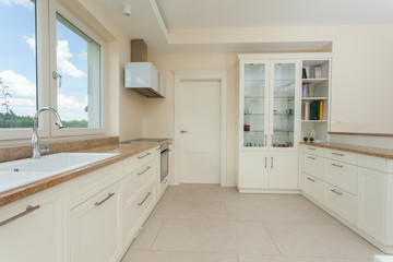 Modern white kitchen with granite tops