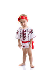 Little girl in the Ukrainian national clothes isolated on white