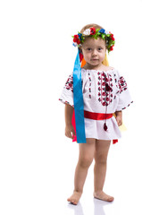 Little girl in the Ukrainian national clothes isolated on white