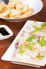 steamed chicken with tofu on a side
