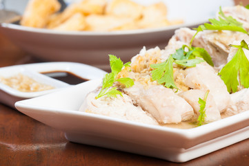 steamed chicken with tofu on a side