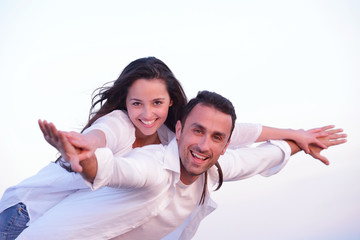 Obraz premium young couple on beach have fun