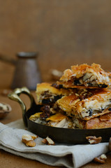 Tray with baklava - traditional oriental sweet with honey, walnu