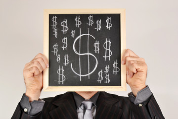 Businessman with dollar blackboard