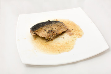 Sardines fish on dish on a white background