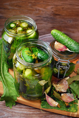 freshly made pickled cucumbers in jars