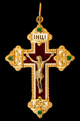 Christian yellow golden cross with emeralds on black