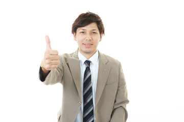 ガッツポーズのビジネスマン