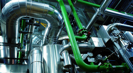 Fototapeta premium Equipment, cables and piping as found inside of a modern industr
