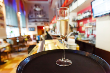 glass of champagne in cafe