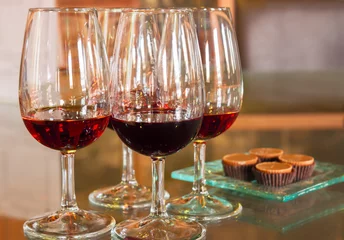 Fotobehang glasses of ruby port wine © neirfy